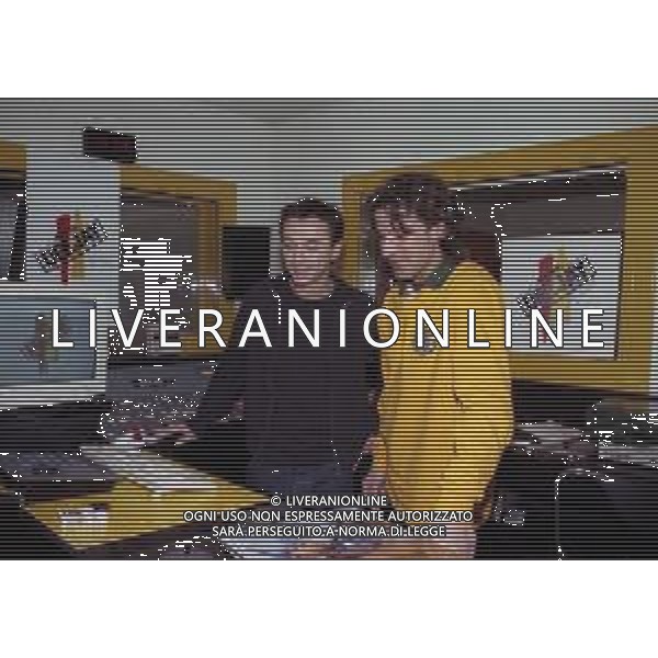 NEG COL-RETROSPETTIVA ALESSANDRO DEL PIERO CALCIATORE NELLA FOTO ALESSANDRO DEL PIERO CON DJ ALBERTINO A RADIO DEEJAY A MILANO IL GIORNO 22-08-1999 AG ALDO LIVERANI SAS