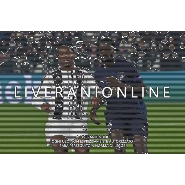 10.12..2025 Allianz Stadium TVAF-©Alessandro Falzone/Ag. Aldo Liverani sas Juventus vs Patos Champions League 2025/2026 Nella foto: Jonathan David-Derrick Luckassen ©TVAF Falzone - AGENZIA ALDO LIVERANI SAS
