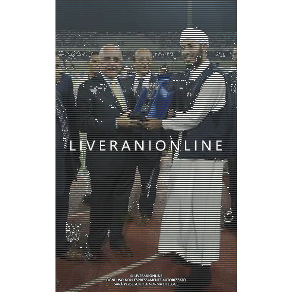 TRIPOLI 25/08/2002 SUPERCOPPA ITALIANA JUVENTUS-PARMA NELLA FOTO ADRIANO GALLIANI-LUCIANO MOGGI- AL SAADI GHEDDAFI FOTO BAGNAI-ALDO LIVERANI