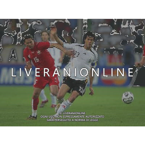 Germani - Polonia Mondiali Germania FIFA World Cup 14/06/2006 nella foto Michael Ballack con Radomski copyright by firo sportphoto/Ag. Aldo Liverani Only Italy