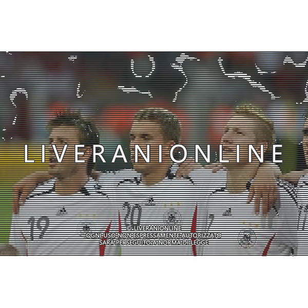 Germani - Polonia Mondiali Germania FIFA World Cup 14/06/2006 nella foto SCHNEIDER, PODOLSKI e SCHWEINSTEIGER durante l\'inno nazionale copyright by firo sportphoto/Ag. Aldo Liverani Only Italy