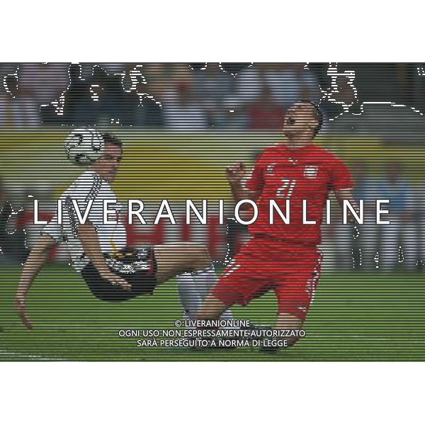 Germani - Polonia Mondiali Germania FIFA World Cup 14/06/2006 nella foto METZELDER con JELEN copyright by firo sportphoto/Ag. Aldo Liverani Only Italy