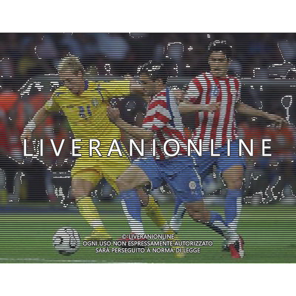 Berlino 1/06/2006 World Cup Germany 2006 svezia-paraguay nella foto wilhelmsson, acuna e riveros ph marco luzzani/aga aldo liverani s.a.s.
