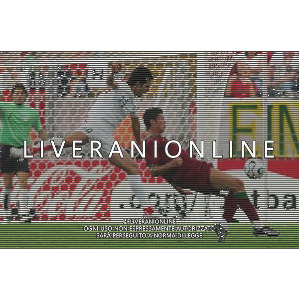 Portogallo - Iran mondiali germania 17/06/2006 nella foto Cristiano Ronaldo con Mohammad Nosrati copyright by firo sportphoto/ag. aldo liverani ONLY ITALY