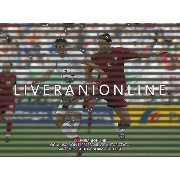 Portogallo - Iran mondiali germania 17/06/2006 nella fotot Fernando Meira con Vahid Hashemian copyright by firo sportphoto/ag. aldo liverani ONLY ITALY