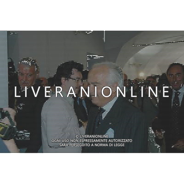 Genova, 15/06/06 Inaugurazione della mostra \'Semper uniti in gloria. I sessant\'anni della Sampdoria\' Nella foto: Il Presidente Riccardo Garrone assediato da giornalisti e fotografi, ma sorride ph alessandro pintimalli / ag aldo liverani s.a.s.