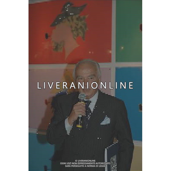 Genova, 15/06/06 Inaugurazione della mostra \'Semper uniti in gloria. I sessant\'anni della Sampdoria\' Nella foto: Il Presidente Riccardo Garrone posa davanti alla parete con il simbolo della Societa\' blucerchiata stilizzato ed in vari colori ph a