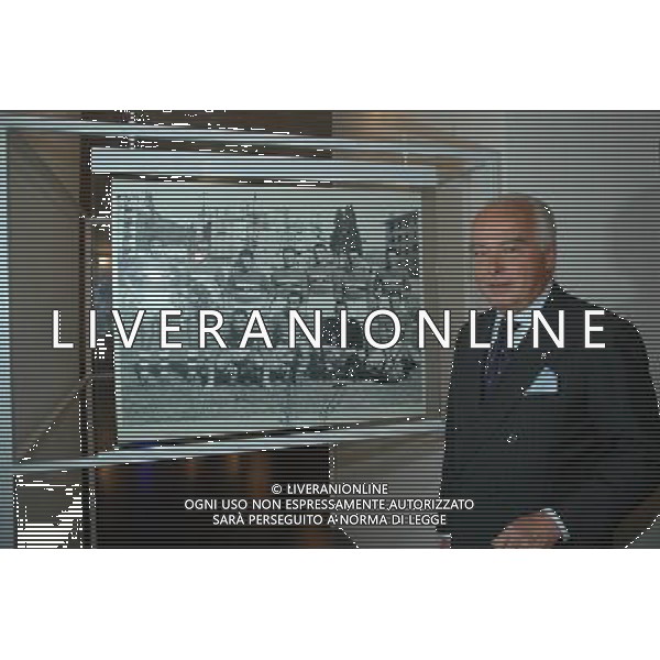 Genova, 15/06/06 Inaugurazione della mostra \'Semper uniti in gloria. I sessant\'anni della Sampdoria\' Nella foto: Il Presidente Riccardo Garrone posa davanti ad una foto di squadra del 1946 ph alessandro pintimalli / ag aldo liverani s.a.s.