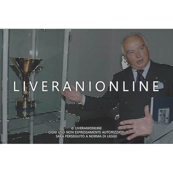 Genova, 15/06/06 Inaugurazione della mostra \'Semper uniti in gloria. I sessant\'anni della Sampdoria\' Nella foto: Il Presidente Riccardo Garrone indica la coppa vinta nel 1991, in occasione della conquista del primo ed unico scudetto vinto dalla