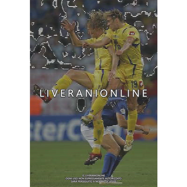 Italia - Ucraina Mondiali Germania 30/06/2006 nella foto luca toni e gusin e kalinichenko ph luzzani/ag. aldo liverani