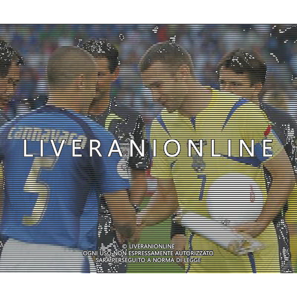 Italia - Ucraina Mondiali Germania 30/06/2006 nella foto fabio cannavaro con andriy shevchenko ph luzzani/ag. aldo liverani