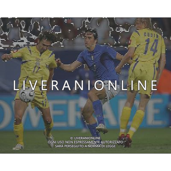 Italia - Ucraina Mondiali Germania 30/06/2006 nella foto luca toni vashchuk e gusin ph luzzani/ag. aldo liverani