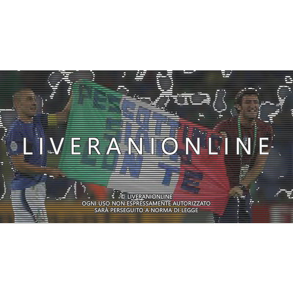 Italia - Ucraina Mondiali Germania 30/06/2006 nella foto ciro ferrara e fabio cannavaro mostrano uno striscione per pessotto a fine gara ph luzzani/ag. aldo liverani