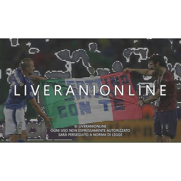 Italia - Ucraina Mondiali Germania 30/06/2006 nella foto ciro ferrara e fabio cannavaro mostrano uno striscione per pessotto a fine gara ph luzzani/ag. aldo liverani