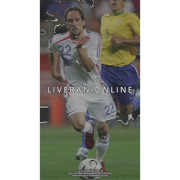 Francoforte 01-07-2006 World Cup Germany 2006 brasile-francia 0:1 nella foto roberto carlos e ribery ph marco luzzani/ag aldo liverani s.a.s.