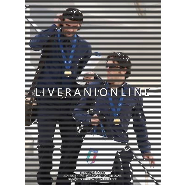 Arrivo dei giocatori Vincitori dei Campionati Mondiali Germania 2006 all\' aeroporto Militare di Pratica di Mare a Roma 10/07/2006 nella foto luca toni e vincenzo iaquinta ph corradetti/ag. aldo liverani