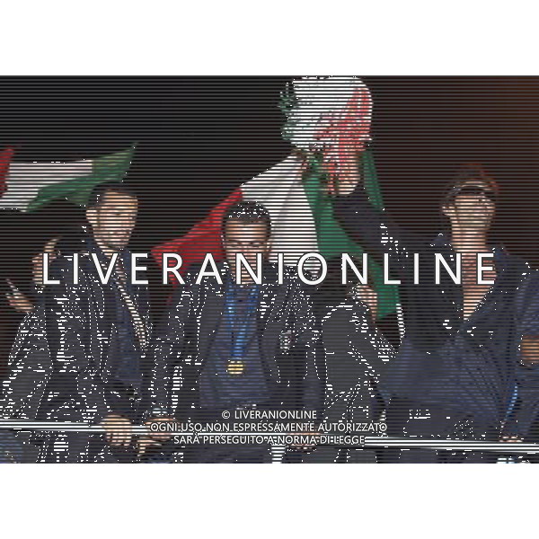 Arrivo al Circo Massimo di Roma dei giocatori della nazionale italiana vincitori dei Campionati Mondiali Germania 10/07/2006 nella foto gianluca zambrotta, simone barone e gianluigi buffon ph corradetti/ag. aldo liverani