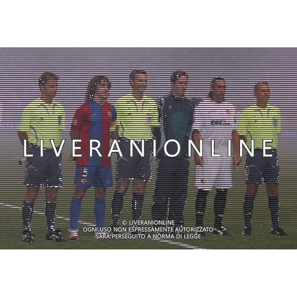 Barcellona - Siviglia Supercoppa Europea a Montecarlo 25/08/2006 nella foto arbitro stefano farina con trefoloni e puyol ph luzzani/ag. aldo liverani