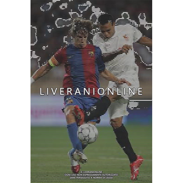Barcellona - Siviglia Supercoppa Europea a Montecarlo 25/08/2006 nella foto puyol e luis fabiano ph luzzani/ag. aldo liverani