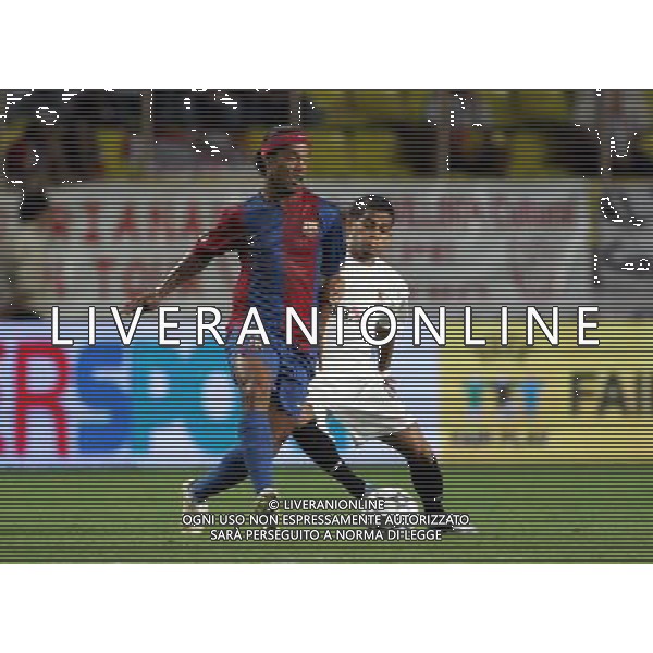 Barcellona - Siviglia Supercoppa Europea a Montecarlo 25/08/2006 nella foto ronaldinho e dani alves ph luzzani/ag. aldo liverani