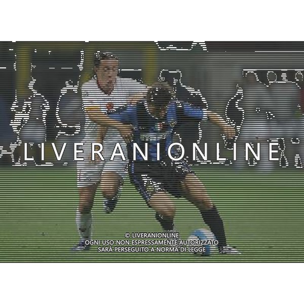 Milano 26-08-2006 inter-roma 4:3 Supercoppa Italiana TIM 2006 nella foto zanetti javier con taddei rodrigo ferante * ph marco luzzani/ag aldo liverani s.a.s.