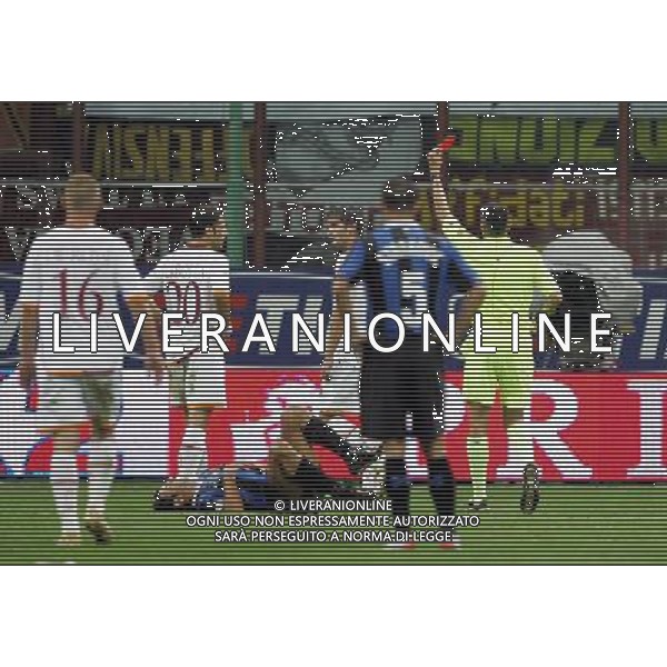 Milano 26-08-2006 inter-roma 4:3 Supercoppa Italiana TIM 2006 nella foto espulsione di christian chivu dopo il fallo su figo che  a terra * ph marco luzzani/ag aldo liverani s.a.s.