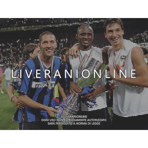 Inter - Roma Supercoppa Italiana Tim 26/08/2006 nella foto marco materazzi, patrick vieira e zlatan ibrahimovic esultanti a fine gara con la Coppa ph santandrea/ag. aldo lvierani