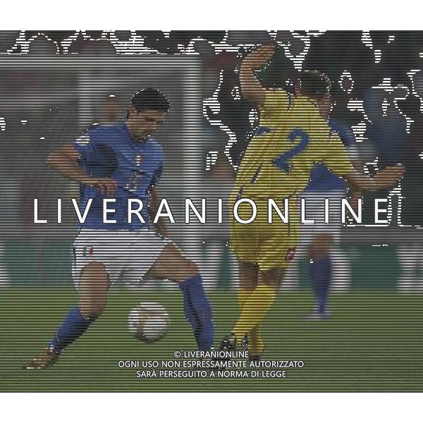 Italia - Ucraina Qualificazioni europei 2008 - Roma 07/10/2006 nella foto vincenzo iaquinta con nesmachnyi ph andry/ag. aldo liverani