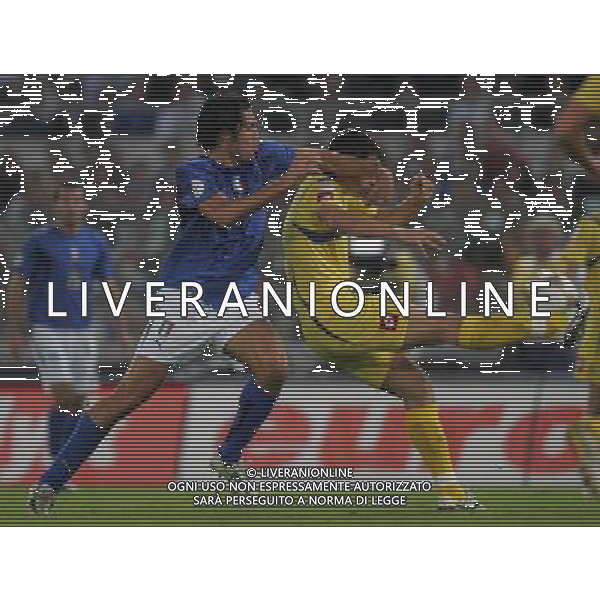 Italia - Ucraina Qualificazioni europei 2008 - Roma 07/10/2006 nella foto luca toni con rusol ph andry/ag. aldo liverani