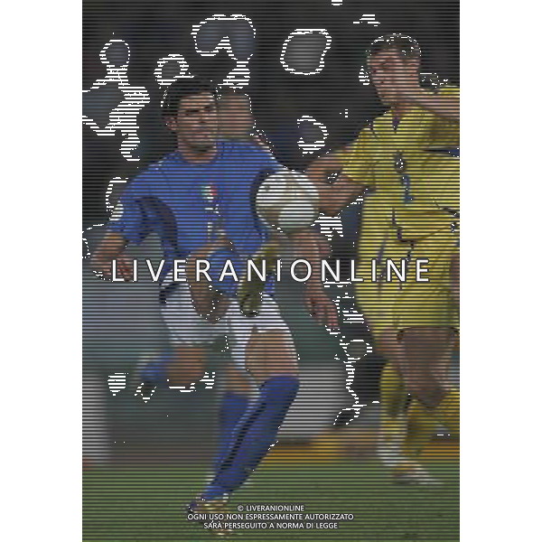 Italia - Ucraina Qualificazioni europei 2008 - Roma 07/10/2006 nella foto vincenzo iaquinta con nesmachnyi ph andry/ag. aldo liverani