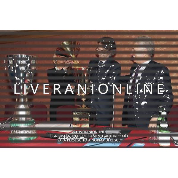 Milano 18/12/2006 consiglio generale lega calcio e premiazione anno sportivo 2005/06 nella foto matarrese antonio e moratti massimo con le tre coppe coppa italia, campionato e supercoppa italia ph marco luzzani/ag aldo liverani s.a.s.