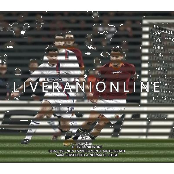 Roma - Lione Olympique Lyonnais - 21/02/2007 UEFA Champions League 2006-2007 Andata Ottavi di Finale nella foto: francesco totti e Jeremy TOULALAN ph Corradetti / Ag. Aldo Liverani