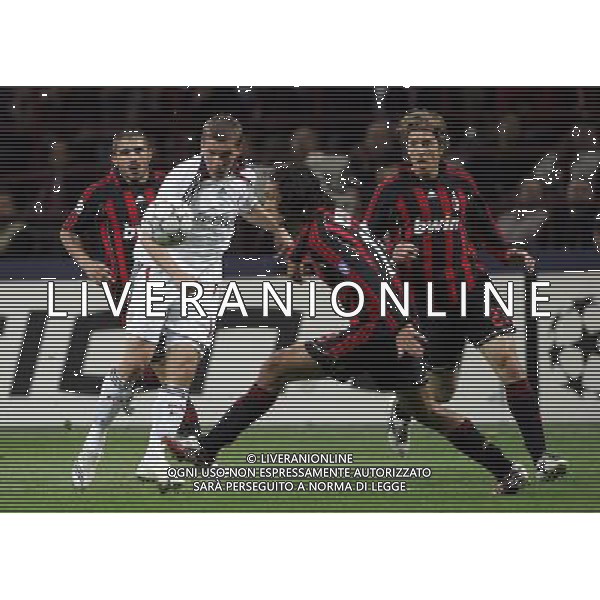MILAN - BAYERN MONACO CHAMPIONS LEAGUE 02/04/2007 NELLA FOTO podolski con massimo ambrosini gennaro gattuso e alessandro nesta FOTO LUZZANI-AAG ALDO LIVERANI