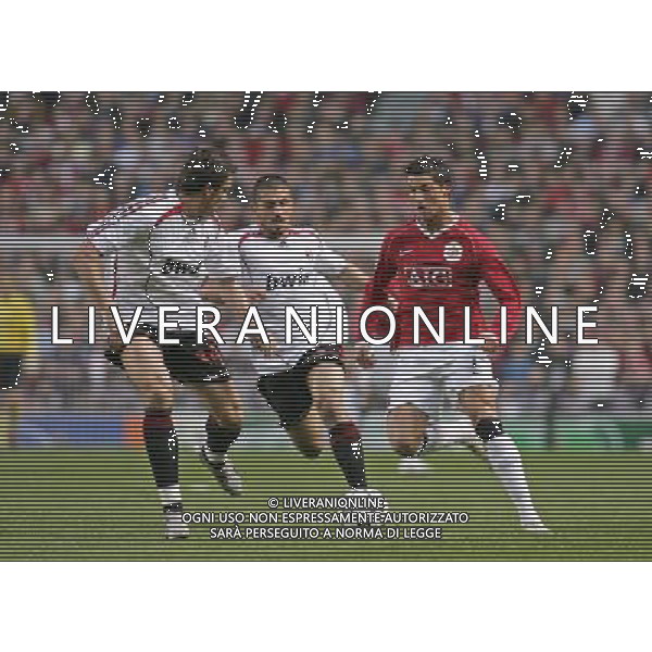 Manchester United - Milan, Champions League, SemiFinale First Leg 24/04/2007 nella foto Cristiano Ronaldo con Massimo Oddo e Gennaro Gattuso Ph IPS PHOTO AGENCY/Ag. Aldo Liverani 