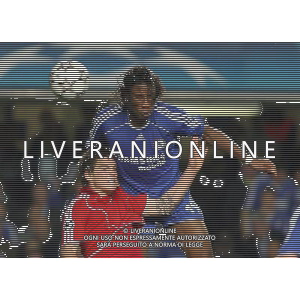 Chelsea - Liverpool, Champions League, SemiFinale First Leg, Stamford Bridge, London 25/04/2007 nella foto Didier Drogba con Daniel Agger Ph IPS PHOTO AGENCY/Ag. Aldo Liverani 