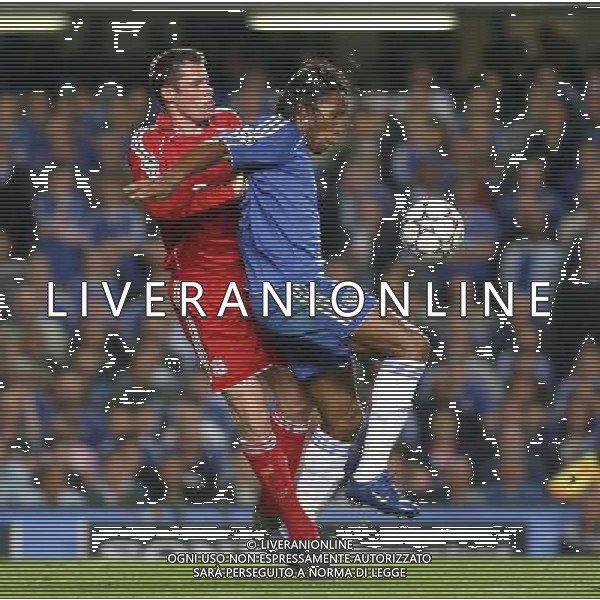 Chelsea - Liverpool, Champions League, SemiFinale First Leg, Stamford Bridge, London 25/04/2007 nella foto Didier Drogba con Jamie Carragher Ph IPS PHOTO AGENCY/Ag. Aldo Liverani 