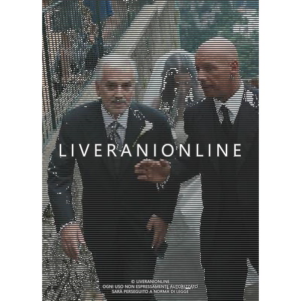 Ravello, 30 Maggio 2007. Giancarlo Pagnozzi (SX) con un bodyguard, accompagna la figlia Gabriella all\'altare.. Alessandro Nesta e Gabriella Pagnozzi, si uniranno in matrimonio oggi nella chiesa delle Grazie a Ravello, si aspettano come invitati i calciat