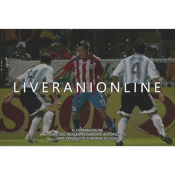 COPPA AMERICA VENEZUELA 2007 INTERNATIONAL FOOTBALL 05/07/2007 ARGENTINA - PARAGUAY (Stadium Metropolitano Barquisimeto ) NELLA FOTO JAVIER MASCHERANO/ARG _ DANTE LOPEZ /PAR _ HUGO IBARRA /ARG PH GPG/AG. ALDO LIVERANI 