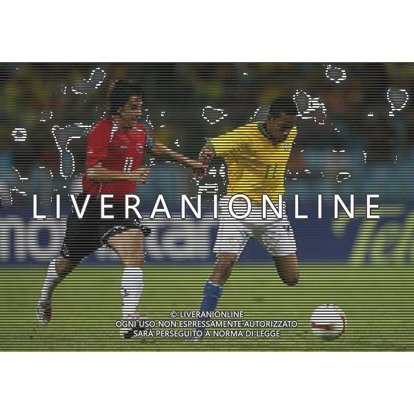 INTERNATIONAL FOOTBALL COPA AMERICA VENEZUELA 2007 BRAZIL-CHILE 6-1 (Stadium J. Antonio Anzoategui Puerto La Cruz ) ROBINHO ( BRAZIL ) -ARTURO SANHUEZA (CHILE) ph GPG/ag aldo liverani s.a.s.
