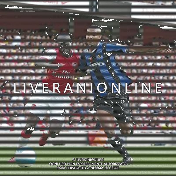 Emmanuel Eboue against Olivier Dacourt , Arsenal v Inter Milan , Emirates Cup, The Emirates Stadium, London, Date 280707, Picture by Ian Kington mobile 07884001265, (IPS PHOTO AGENCY) - 21 Delisle road - London SE28 0JD- tel: 020 88 55 1 008 - fax: 020 88 55 1037 - ISDN: 020 88 55 1039 English Premier and Football League images are only to be used in an editorial context, images are not allowed to be published on another internet site unless a licence has been obtained from DataCo Ltd +44 207 864 9121. AG ALDO LIVERANI