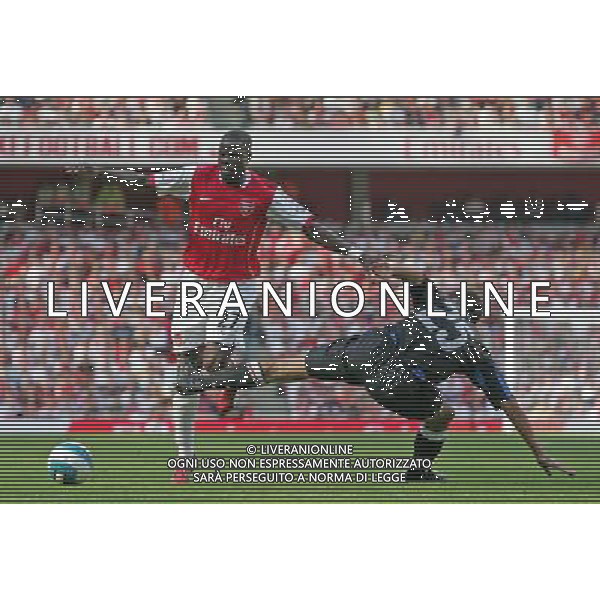 Emmanuel Eboue is fouled by Walter Samuel , Arsenal v Inter Milan , Emirates Cup, The Emirates Stadium, London, Date 280707, Picture by Ian Kington mobile 07884001265, (IPS PHOTO AGENCY) - 21 Delisle road - London SE28 0JD- tel: 020 88 55 1 008 - fax: 020 88 55 1037 - ISDN: 020 88 55 1039 English Premier and Football League images are only to be used in an editorial context, images are not allowed to be published on another internet site unless a licence has been obtained from DataCo Ltd +44 207 864 9121. AG ALDO LIVERANI