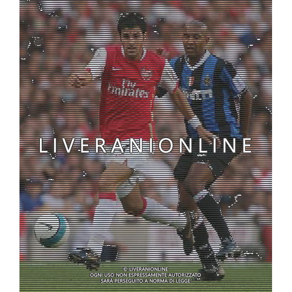 Cesc Fabregas against Olivier Dacourt , Arsenal v Inter Milan , Emirates Cup, The Emirates Stadium, London, Date 280707, Picture by Ian Kington mobile 07884001265, (IPS PHOTO AGENCY) - 21 Delisle road - London SE28 0JD- tel: 020 88 55 1 008 - fax: 020 88 55 1037 - ISDN: 020 88 55 1039 English Premier and Football League images are only to be used in an editorial context, images are not allowed to be published on another internet site unless a licence has been obtained from DataCo Ltd +44 207 864 9121.. AG ALDO LIVERANI
