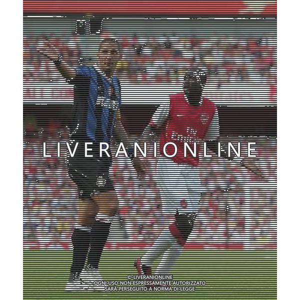 Marco Materazzi gets a yellow card for a challenge on Emmanuel Eboue and he chats to him after and not happy , Arsenal v Inter Milan , Emirates Cup, The Emirates Stadium, London, Date 280707, Picture by Ian Kington mobile 07884001265, (IPS PHOTO AGENCY) - 21 Delisle road - London SE28 0JD- tel: 020 88 55 1 008 - fax: 020 88 55 1037 - ISDN: 020 88 55 1039 AG ALDO LIVERANI