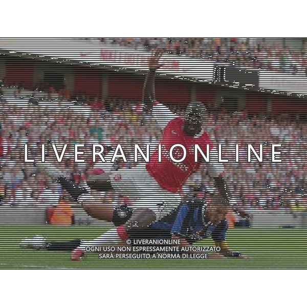 Marco Materazzi gets a yellow card for this challenge on Emmanuel Eboue , Arsenal v Inter Milan , Emirates Cup, The Emirates Stadium, London, Date 280707, Picture by Ian Kington mobile 07884001265, (IPS PHOTO AGENCY) - 21 Delisle road - London SE28 0JD- tel: 020 88 55 1 008 - fax: 020 88 55 1037 - ISDN: 020 88 55 1039 English Premier and Football League images are only to be used in an editorial context, images are not allowed to be published on another internet site unless a licence has been obtained from DataCo Ltd +44 207 864 9121. AG ALDO LIVERANI