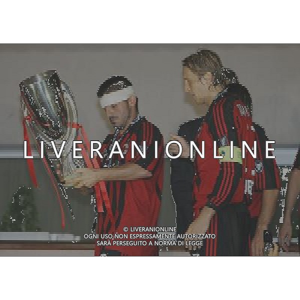 Milan - Siviglia SuperCoppa Europea Monaco Montecarlo 31/08/2007 Premiazione e festeggiamenti dei giocatori del milan vincitore della Coppa nella foto Massimo Ambrosini con Gennaro gattuso con la Coppa ph Ag. Aldo liverani