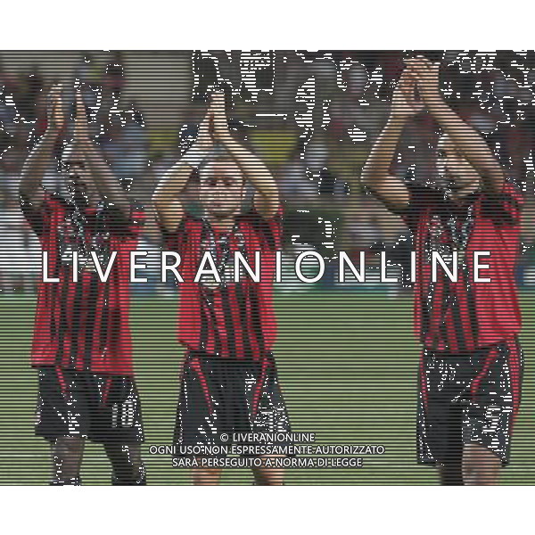 Milan - Siviglia SuperCoppa Europea Monaco Montecarlo 31/08/2007 Premiazione e festeggiamenti dei giocatori del milan vincitore della Coppa nella foto Christian Brocchi con Clarence Seedorf e Emerson applaudono i Tifosi del Siviglia ph Ag. Aldo liverani