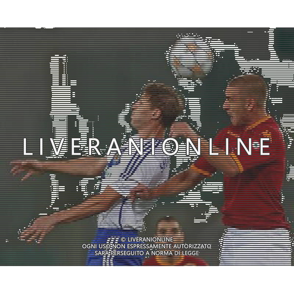 Roma 19 / 09 / 2007 Uefa Champions League 2007/2008 Gruppo F - Roma Vs Dinamo Kiev (2-0) nella foto: Contrasto aereo tra Daniele DE ROSSI e Maksim SHATSKIKH ph Corradetti/ag. Aldo Liverani