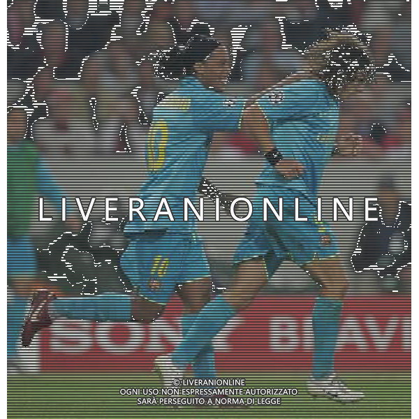 Stoccarda (Germania) 2 ottobre 2007 Stoccarda-Barcellona Champions League 2007/2008 nella foto: esultanza dopo il gol di Puyol Carles con Ronaldinho foto Andry / Ag. Aldo Liverani