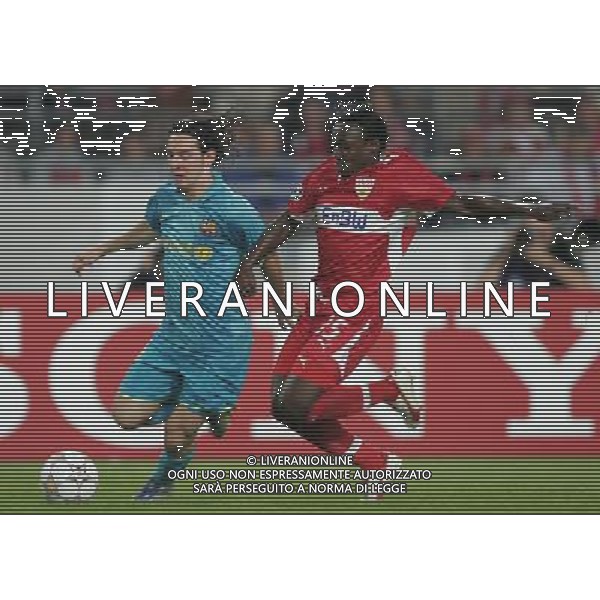 Stoccarda (Germania) 2 ottobre 2007 Stoccarda-Barcellona Champions League 2007/2008 nella foto: Messi Lionel e Boka Arthur foto Andry / Ag. Aldo Liverani