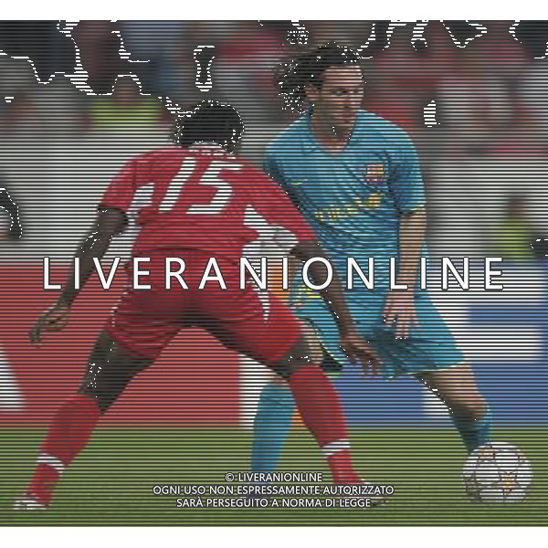 Stoccarda (Germania) 2 ottobre 2007 Stoccarda-Barcellona Champions League 2007/2008 nella foto: Messi Lionel e Boka Arthur foto Andry / Ag. Aldo Liverani